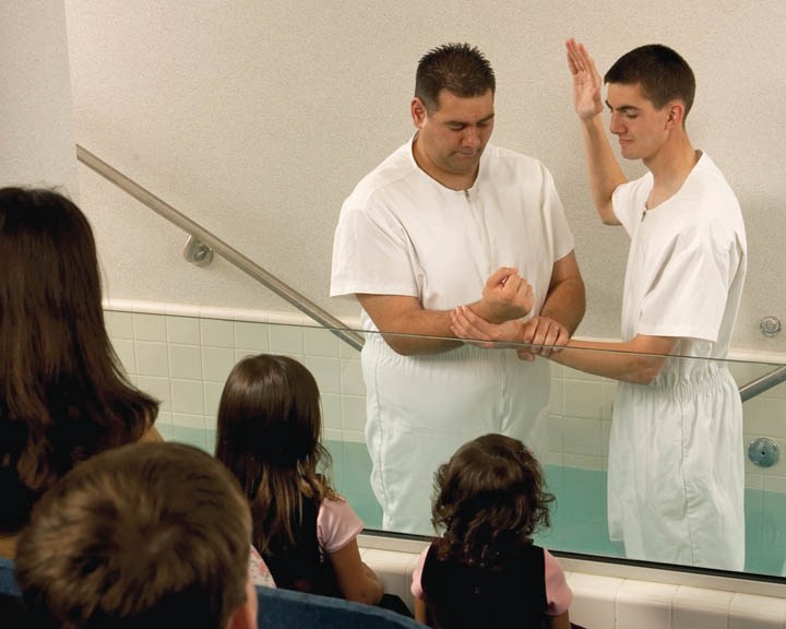 man being baptized