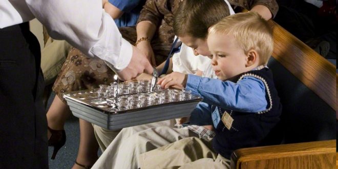 What is the correct posture or stance for passing the Sacrament?