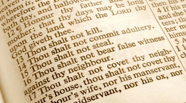 What is the difference between a law and a commandment?